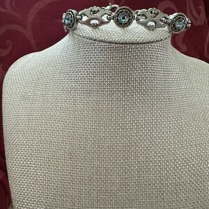 Brighton retired bracelet. Silver, gold and blue crystals